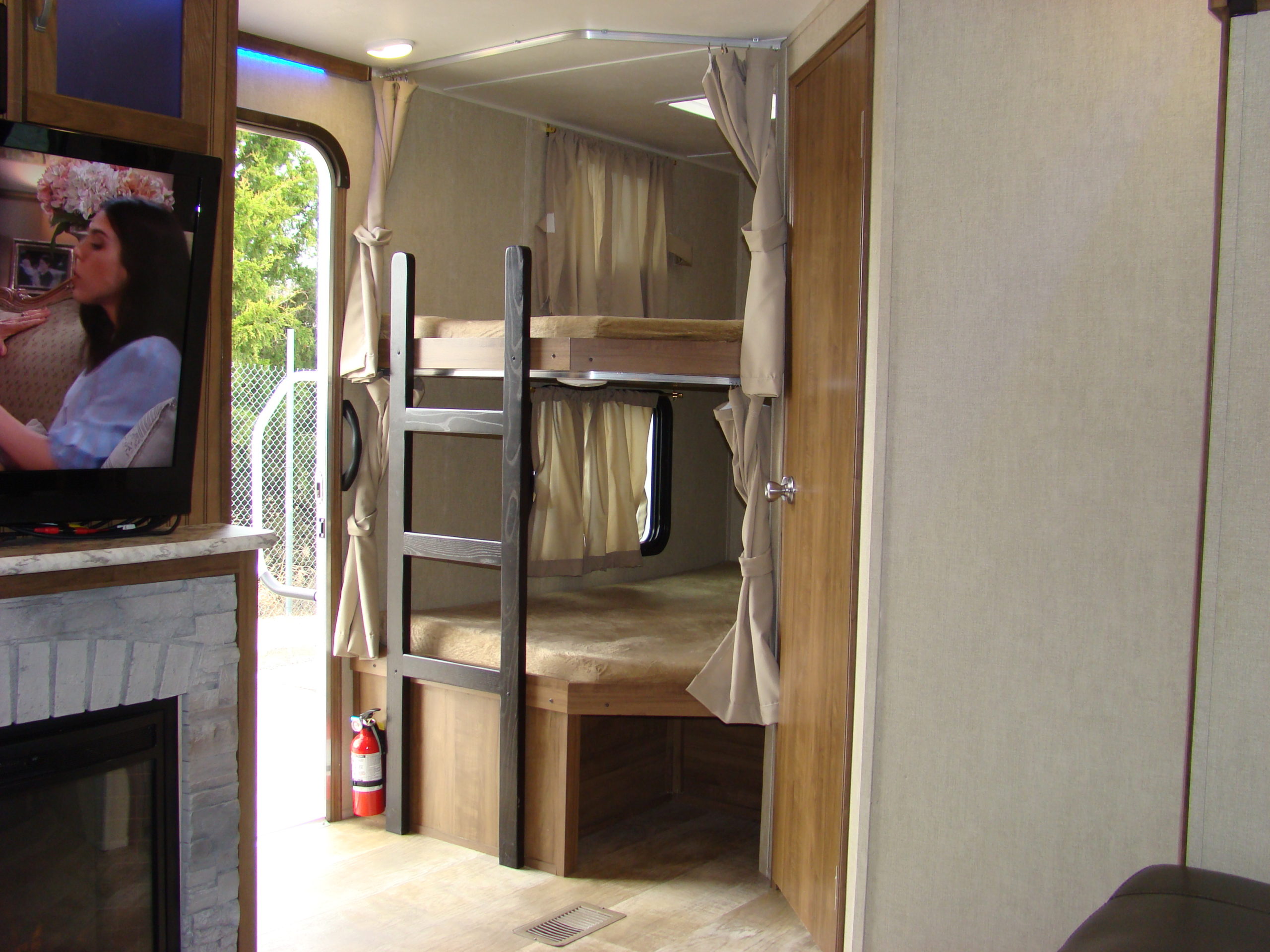 travel trailer with slide in bedroom