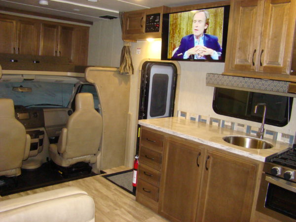 2020 32’ class c rv interior kitchen living room area