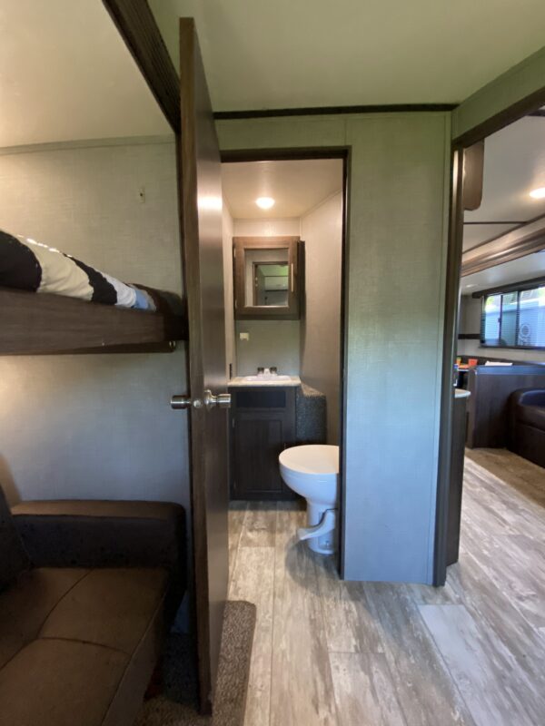 This 1/2 bath is located in the back bedroom